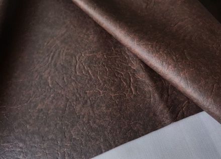 Искусственная кожа 47 темно-коричневое тиснение