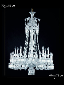 Изысканная классическая хрустальная люстра с многоярусной конструкцией.