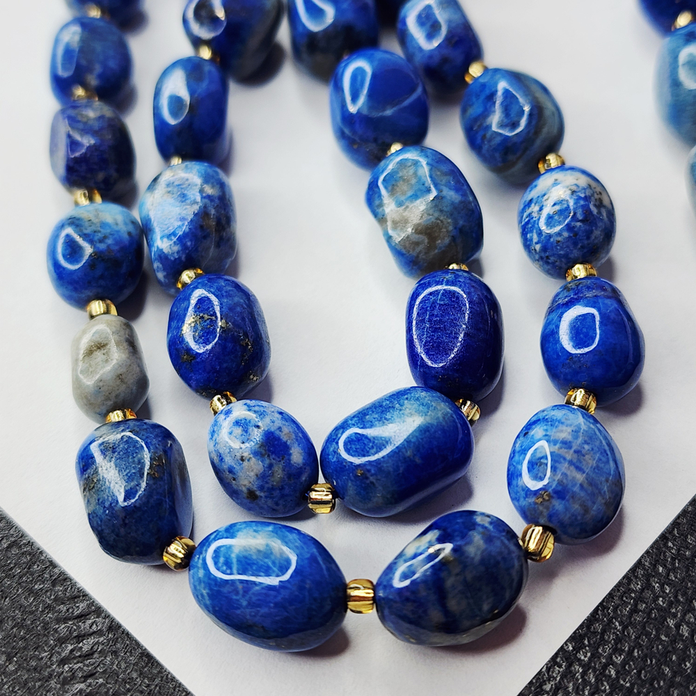 Лазурит с включениями пирита, крупная галтовка, 12-15 мм, камни овалы, цена за нить 12.5 - 13 см (1/3 нити)