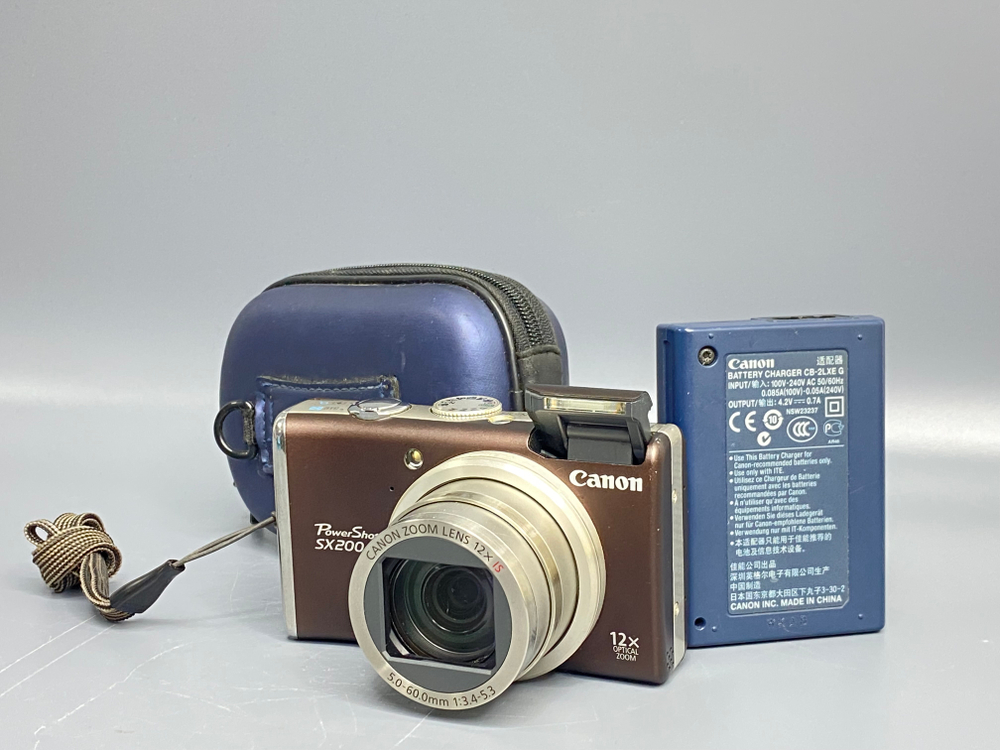 Canon SX200 IS Царапины на линзе