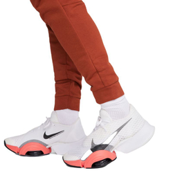 Мужские теннисные штаны Nike Dri-Fit Pant Taper - rugged orange/black