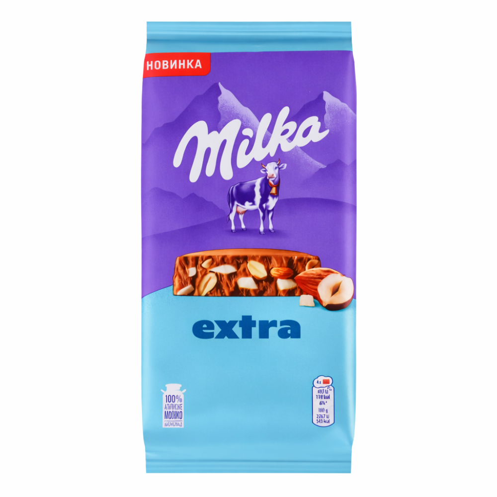 Шоколад Milka extra с лесным орехом,миндалем и крошкой кокосового бисквита 130 гр