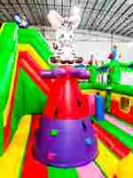 Коммерческий надувной батут "Джунгли" с горкой, 9*6*4.5 м