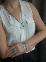 Колье из маленьких круглых звеньев с ярко-голубым кристаллом, замок тоггл