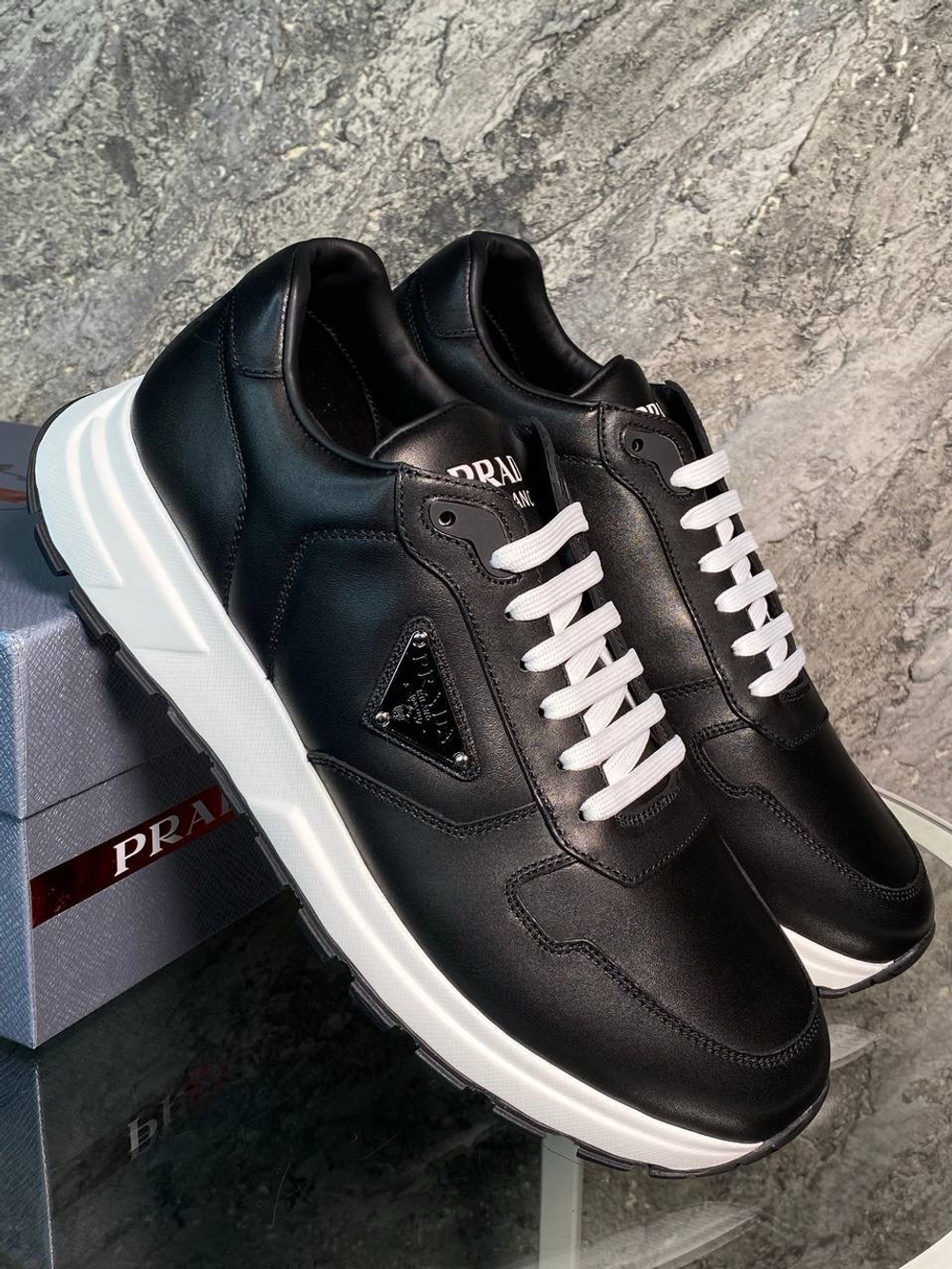 Кроссовки Prada
