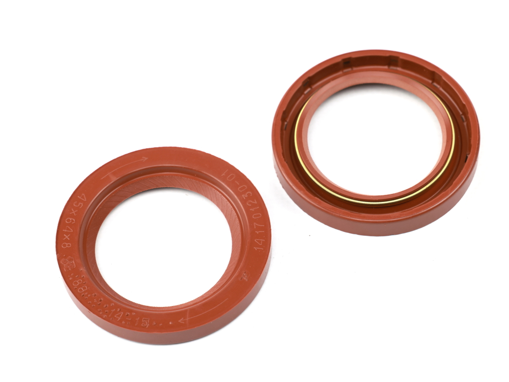 Сальник 45х64х8 а/м КАМАЗ перв. вала коробки передач (красный с пружиной /NBR) Резинотехника г. Балаково ( ОЕ 14.1701230-01 к.(NBR) )