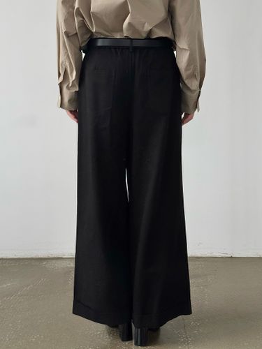 Черные хлопковые брюки-палаццо с защипами