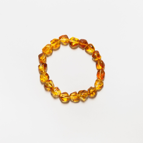 Браслет из цельного натурального янтаря, бусины 10-11 мм "кусанка"