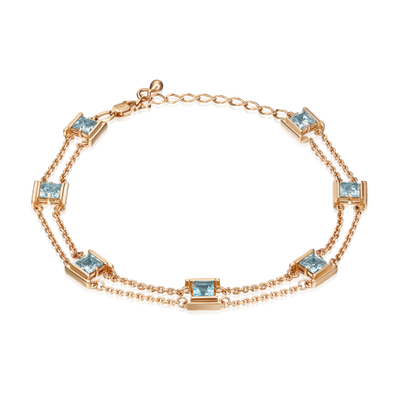 Браслет из красного золота с топазами