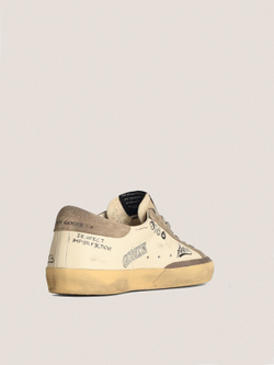 Super Star in white leather with contrasting decorative lettering