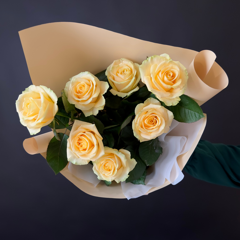 Flower bouquet of 7 Russian creamy roses in package