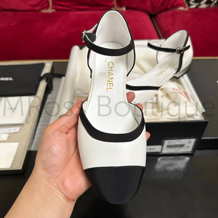 Женские туфли балетки Chanel черно-белого цвета