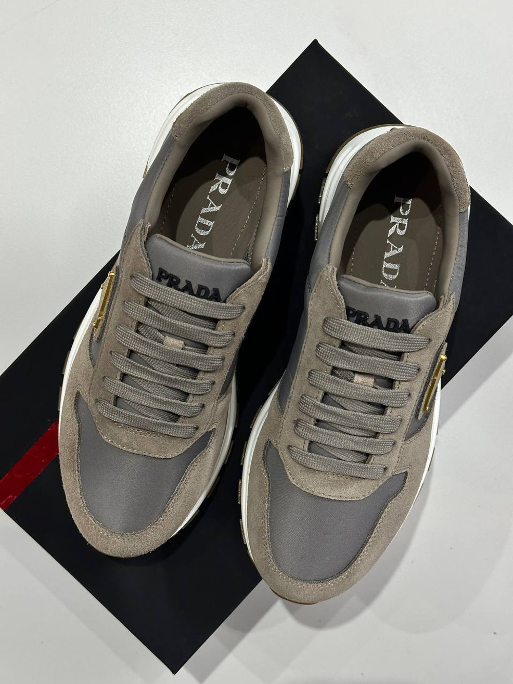 Кроссовки Prada