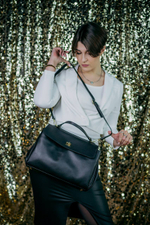 Женская сумка из натуральной кожи ягненка черного цвета