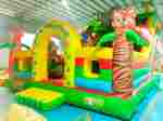 Коммерческий надувной батут «Слоник со скалодромом» 9x6x6