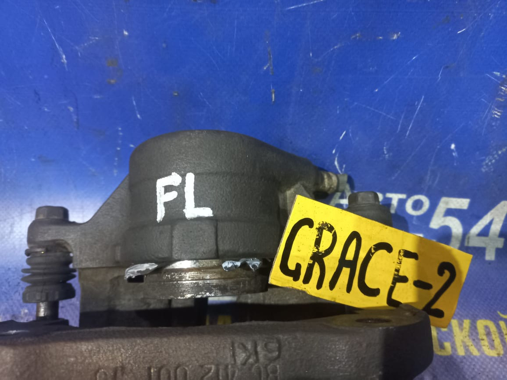 Суппорт тормозной передний левый HYUNDAI Grace 1995