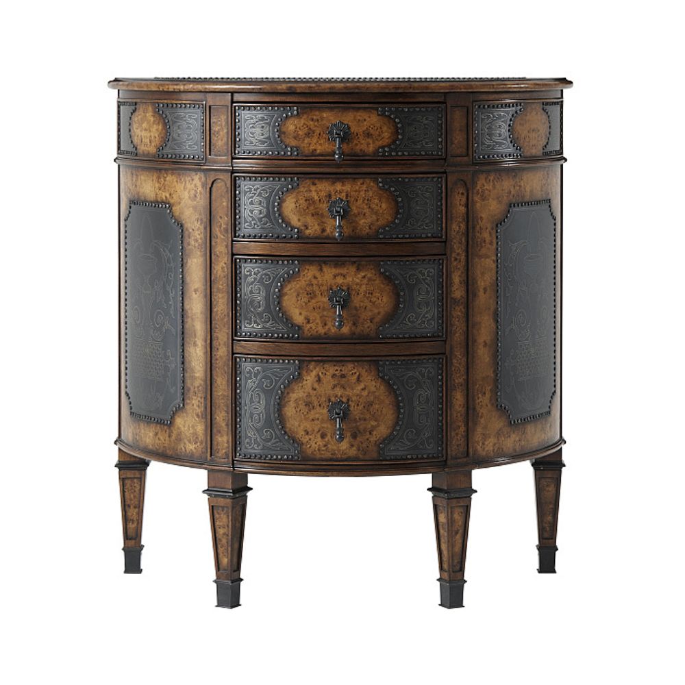Комод с затейливой чеканкой
