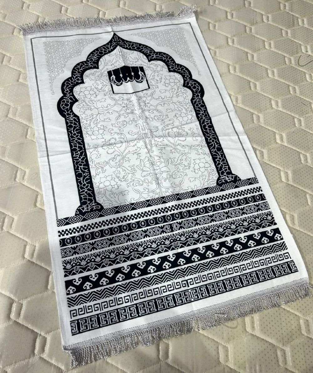 Жайнамаз Шамок