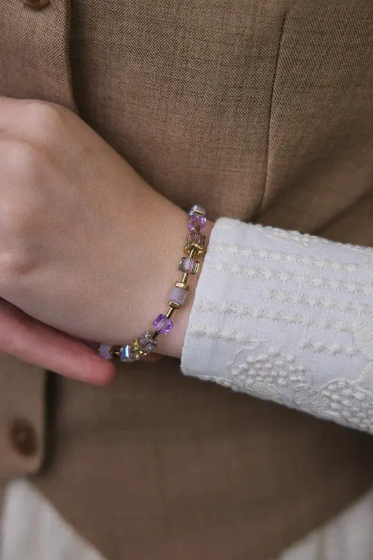 Браслет кубики из сиреневых кристаллов Swarovski и гематита,оттенок золото