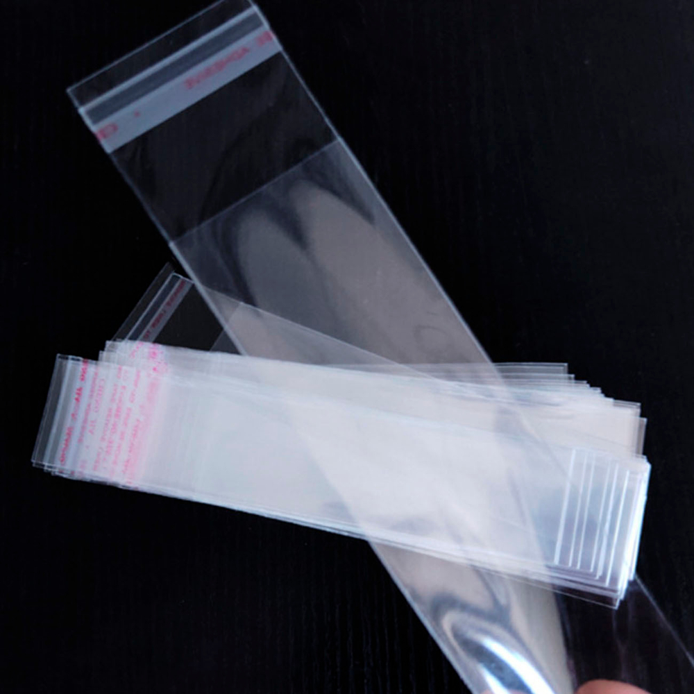 узкие прозрачные пакетики с липким краем