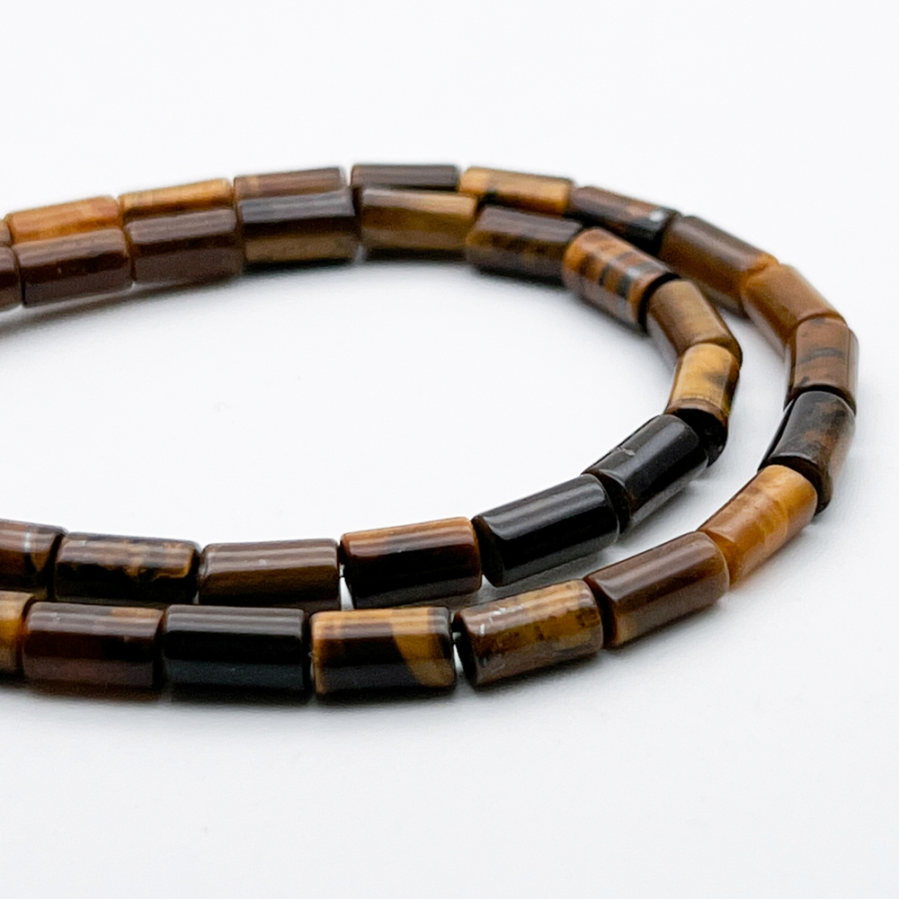 Тигровый глаз бусины, размер около 7*3,7 мм, цена за 13 шт (1/4 нити)