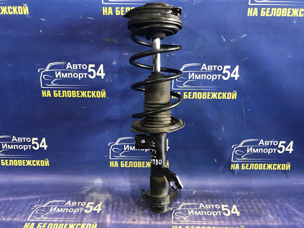 Стойка передняя левая NISSAN TIIDA 2004-2012