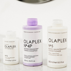 Olaplex N4P Blond Enhancer Toning Shampoo - фиолетовый тонирующий шампунь, нейтрализующий желтоватые оттенки /   250  ml  / GTIN 850018802239