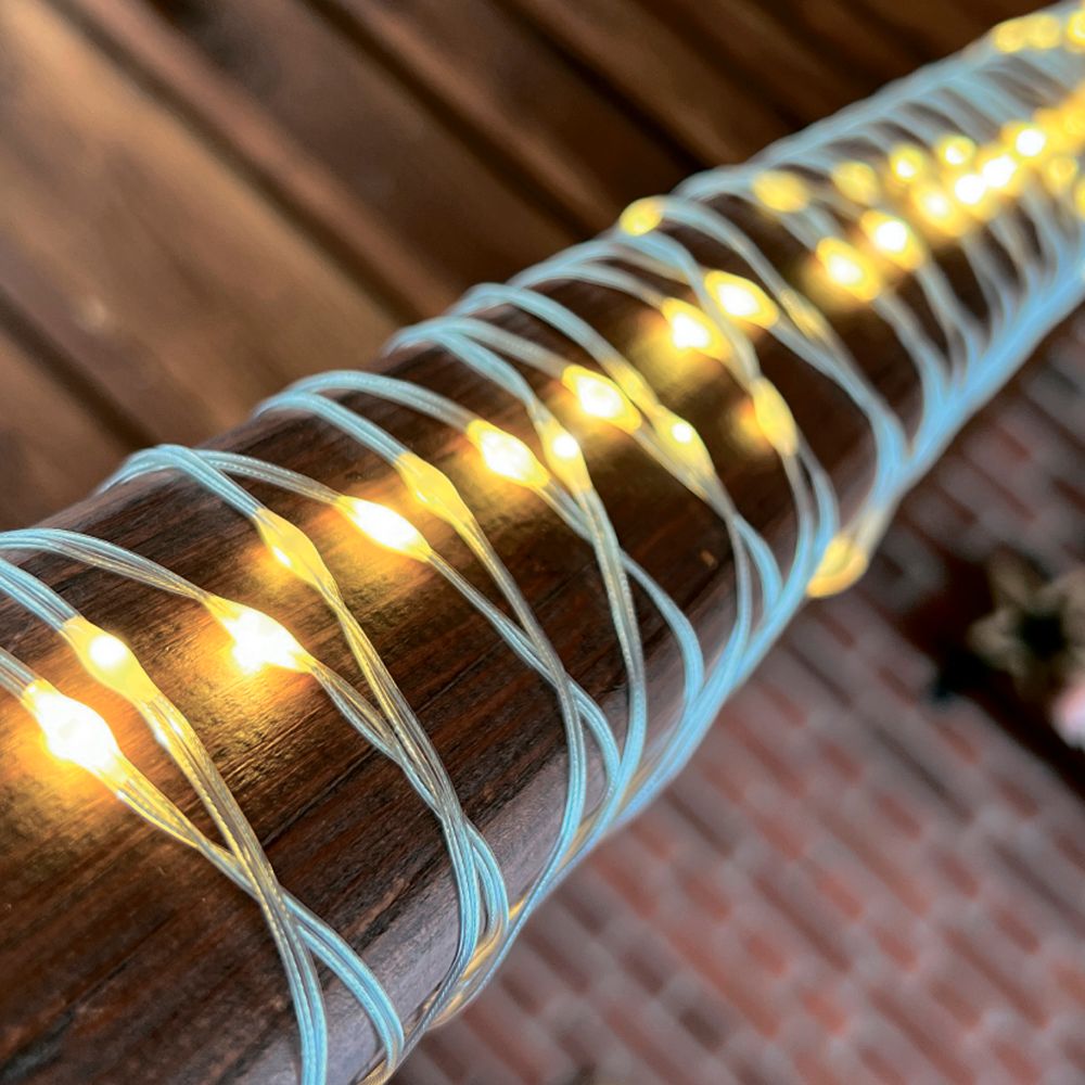 ULD-S1000-100-DTA WARM WHITE IP20 DEW BAND Гирлянда светодиодная Полоса. 10м. 100 светодиодов. Теплый белый свет. Провод прозрачный. ТМ Uniel