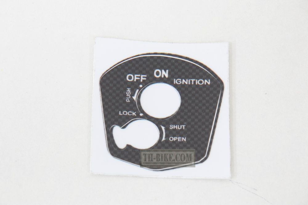 Sticker on ignition switch. Zoomer-X