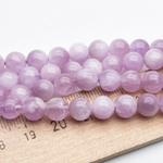 Кунцит бусины, диаметр около 7,5-7,8 мм, цена за 13 шт (1/4 нити)