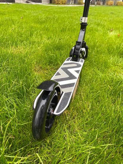 Складной двухколёсный самокат со светящимися колёсами и платформой Micar Flash 145 чёрный