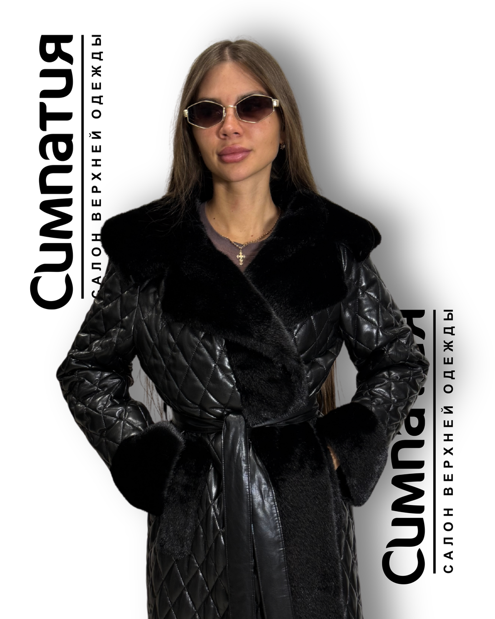 Стильное пальто в черном цвете с декоративными рукавами