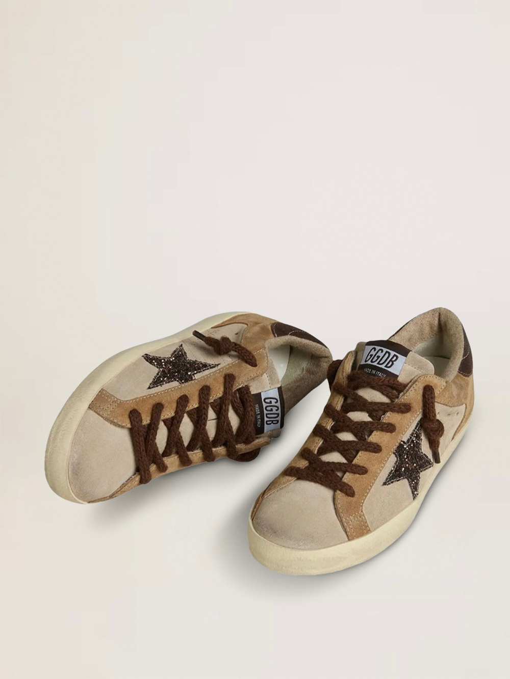 Super Star in beige and brown suede with a dark brown glitter star