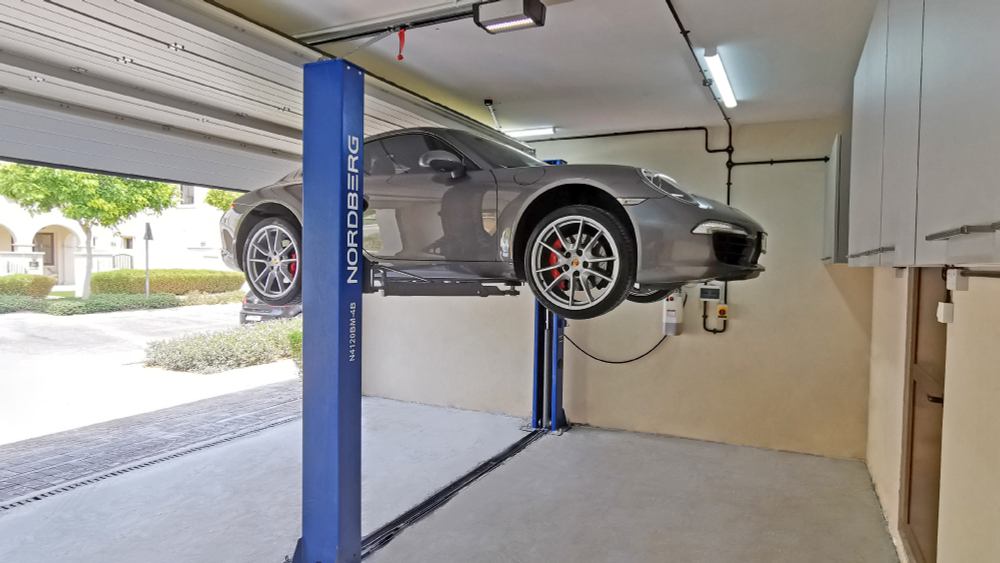 NORDBERG (N4120BM-4B_380) Подъемник 380V 2х стоечный 4т со снятием стопоров с одной колонны (синий)