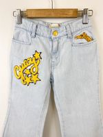 Джинсы Gucci, 116