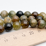 Гранат зеленый бусины (гроссуляр), диаметр 9,2-9,4 мм, цена за 10 шт (1/4 нити)