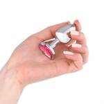 Серебристая анальная пробка с розовым кристаллом в форме сердца - 7 см. (Цвет: розовый)