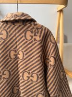 Шерстяное пальто Gucci, 128