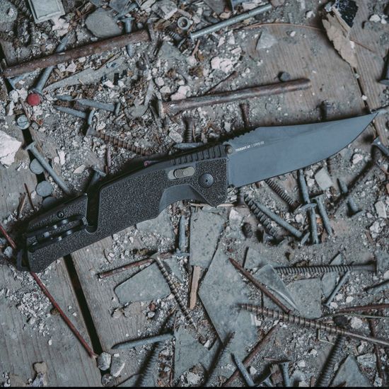 Нож складной SOG Trident AT 11-12-03-41 с клинком из стали D2 (Cryo Term), рукоять GRN