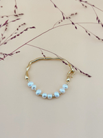 Жемчужный браслет с золотой дугой