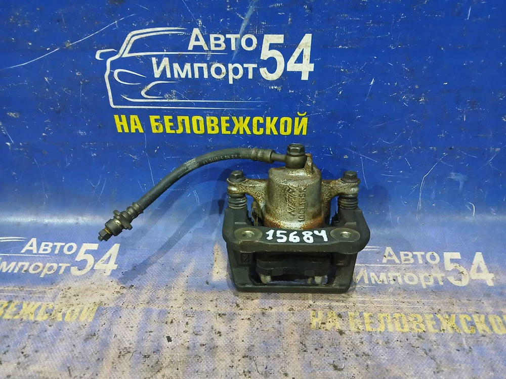 Суппорт тормозной задний правый Honda STEPWGN 1996-2001