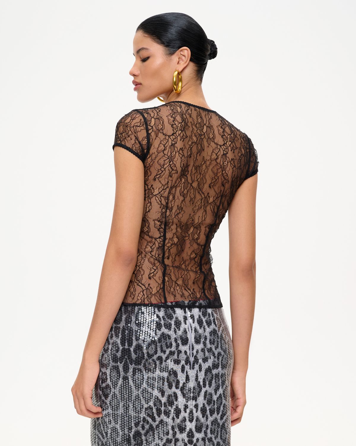 Юбка мини из пайеток с леопардовым принтом