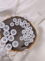 Пуговицы белые на прокол с узким бортиком