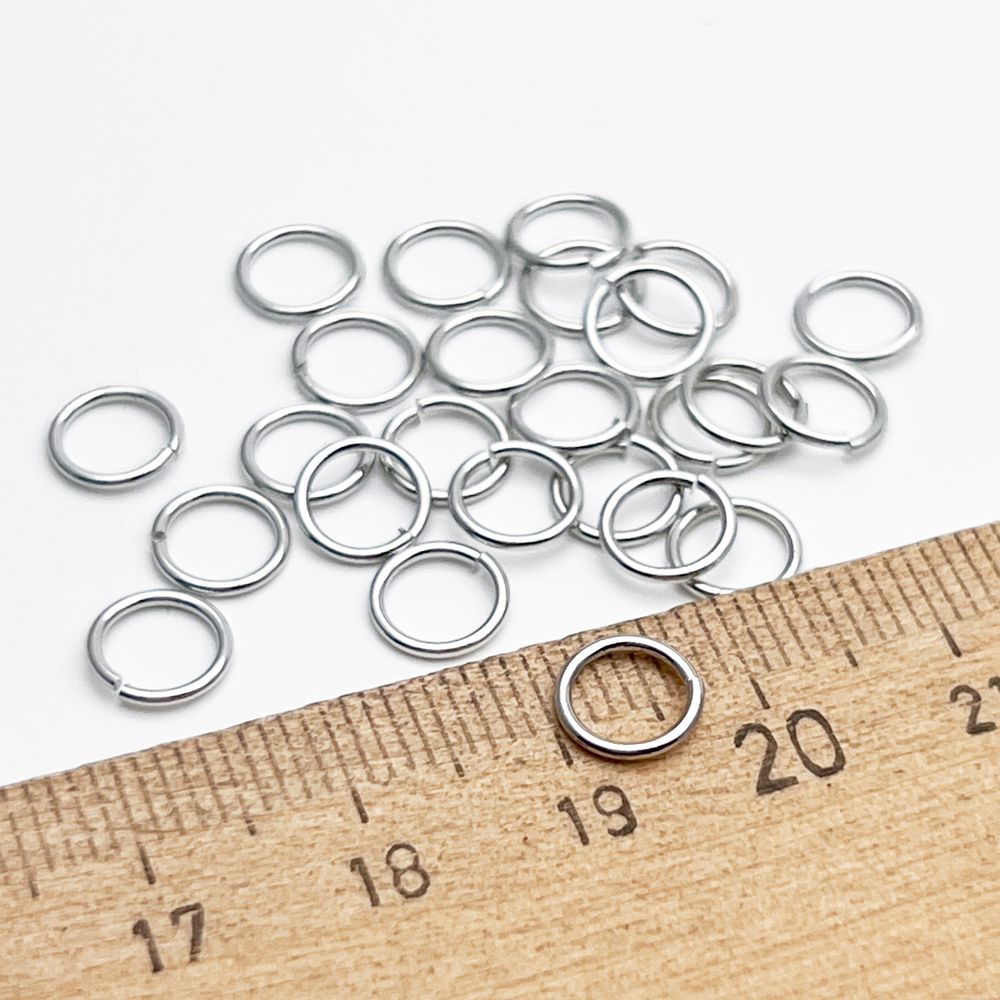 Соединительные колечки, цвет серебро (родий), размер 7*0,8 мм, цена за 2 грамма
