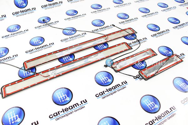 Светодиодные накладки на пороги из нержавейки на Лада Веста (4шт)
