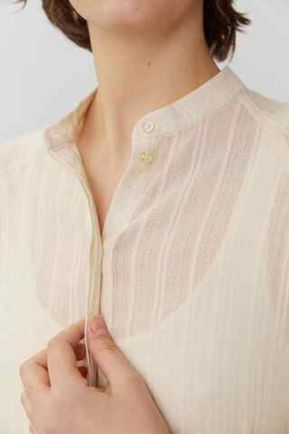 Рубашка покроя реглан из молочного шитья