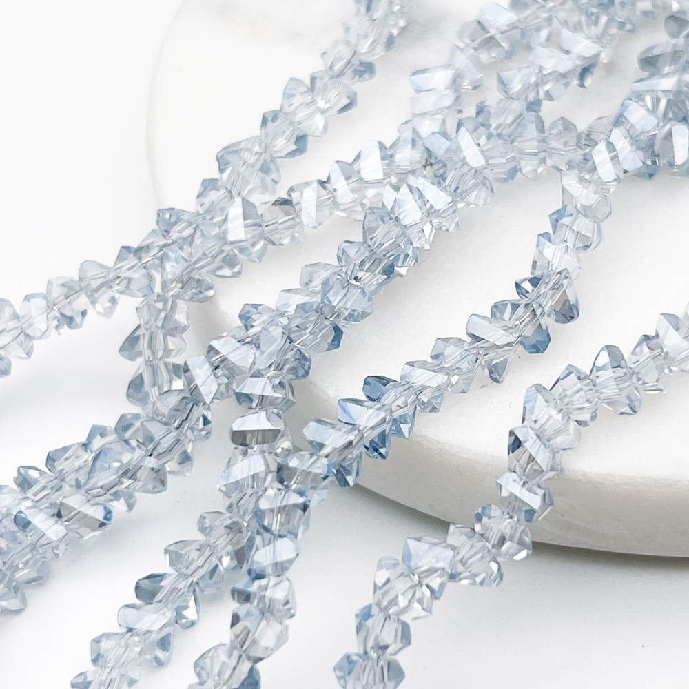 Бусина Треугольник, стекло, цвет голубой АВ, размер около 4,5*5,5 мм, цена за нить 28 см