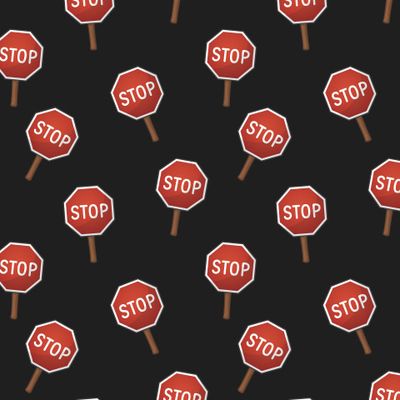 Дорожный знак STOP на чёрном фоне