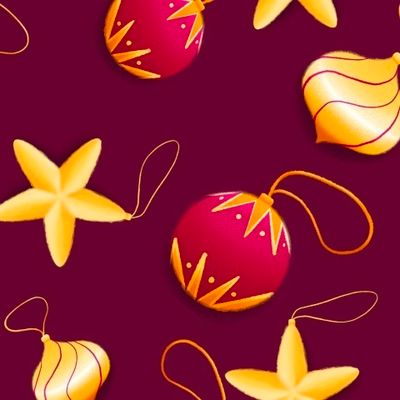 Золотые ёлочные игрушки на винном фоне