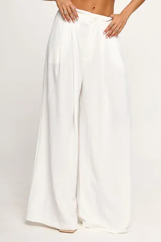 Брюки палаццо свободного кроя белого цвета